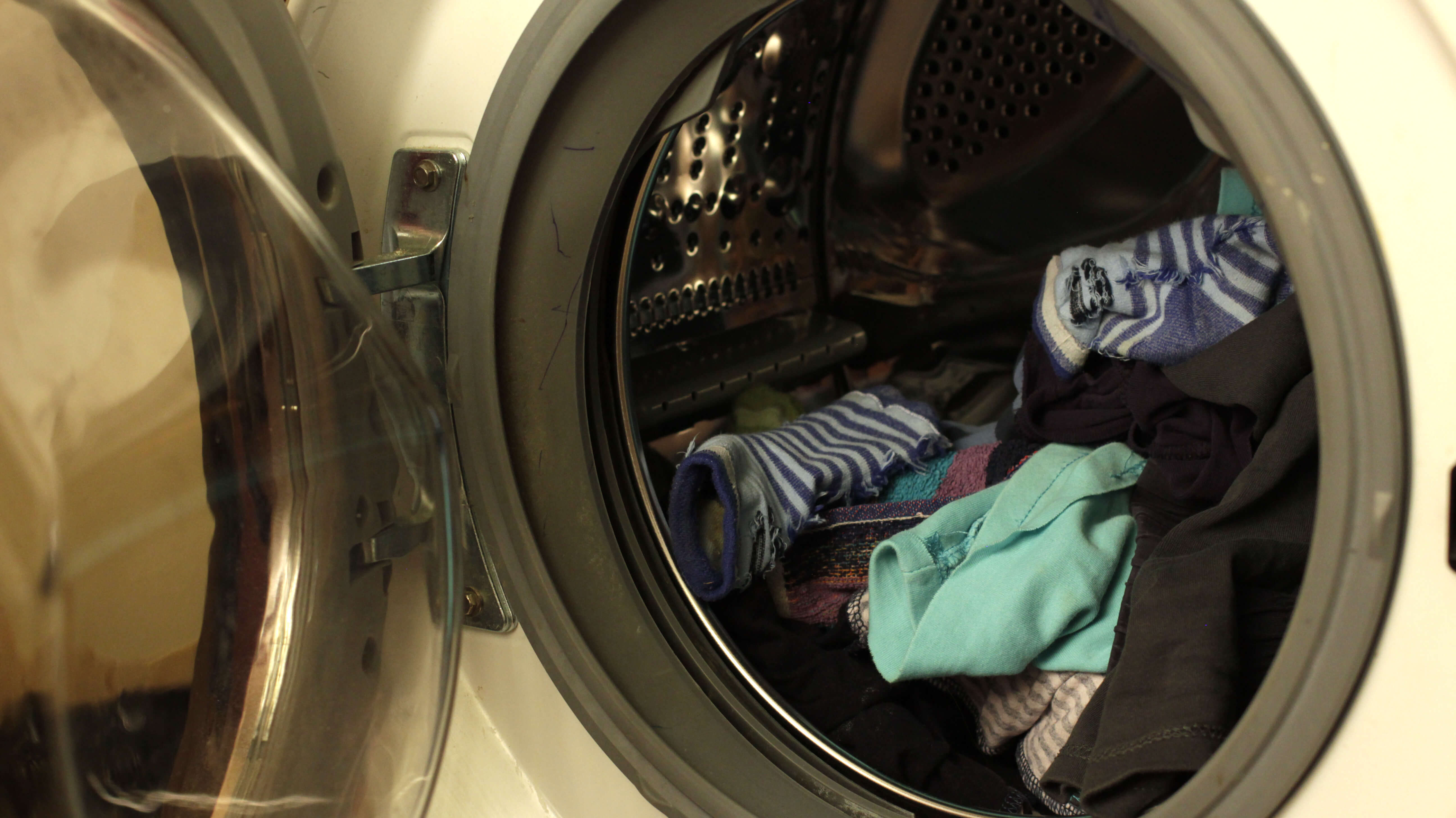 Как отключить стиральную машину во время стирки